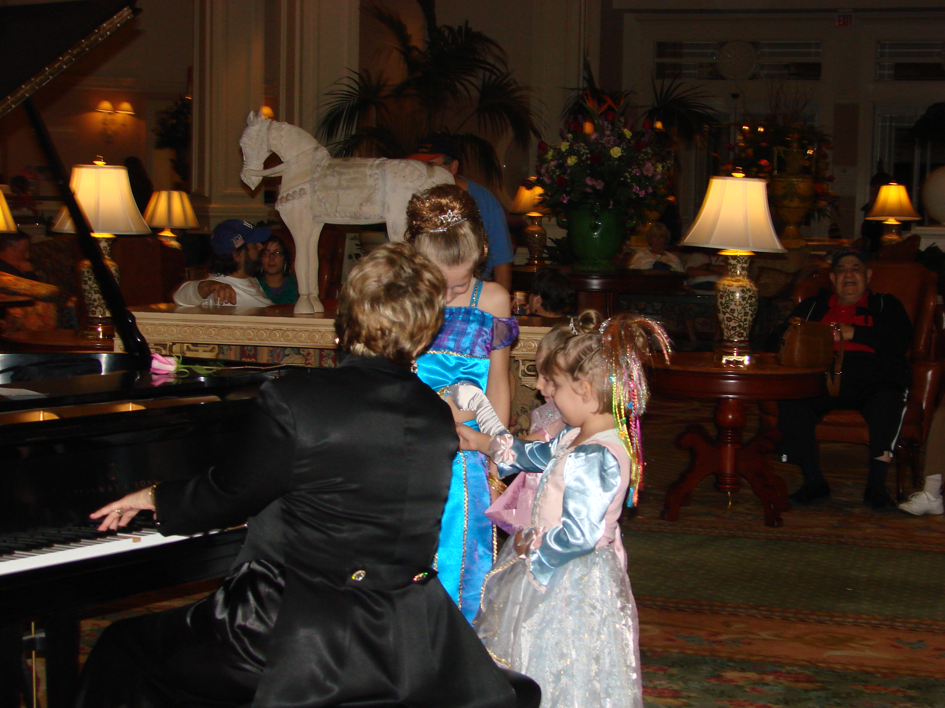 Chatting with the piano player in the Grand Floridian lobby...