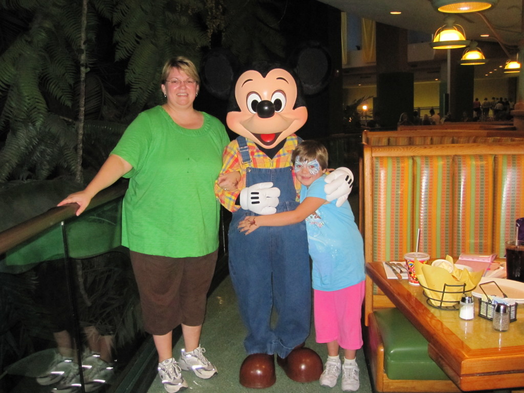 Hugging Mickey on our first Mommy and Me trip! 
